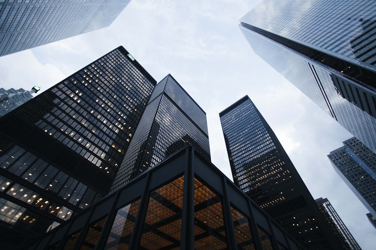 Modern corporate building representing investment and capital growth